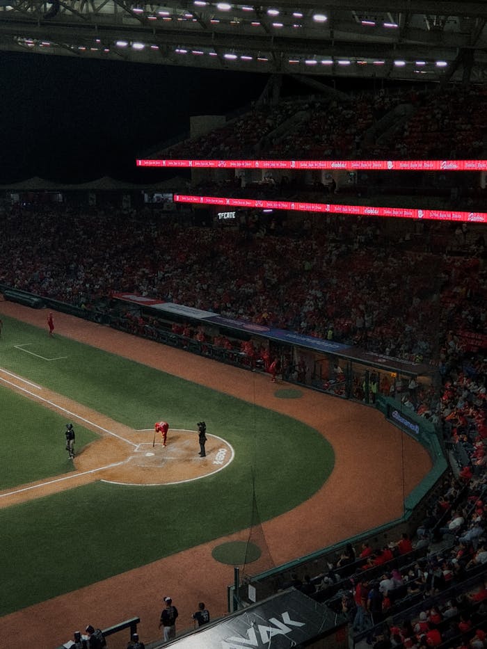 Crowded night baseball game at a stadium in Mexico City with vibrant atmosphere.